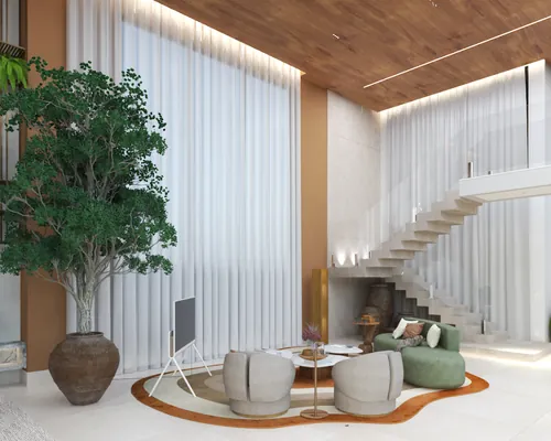 Sala com pé-direito duplo e escada escultural